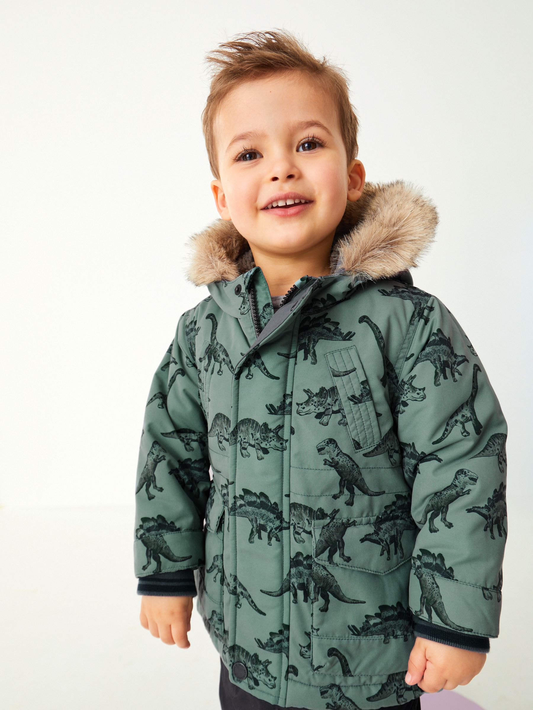 Buy Sage Green Dinosaur Shower Resistant Faux Fur Parka Coat 3mths 7yrs from Next Luxembourg