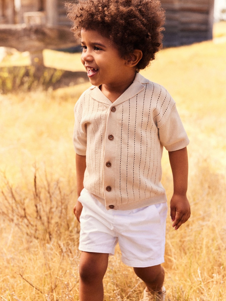 Neutral 100% Cotton Short Sleeved Button Through Polo Shirt (3mths-7yrs) - Image 1 of 9 Neutral 100% Cotton Short Sleeved Button Through Polo Shirt (3mths-7yrs) - Image 1 of 9