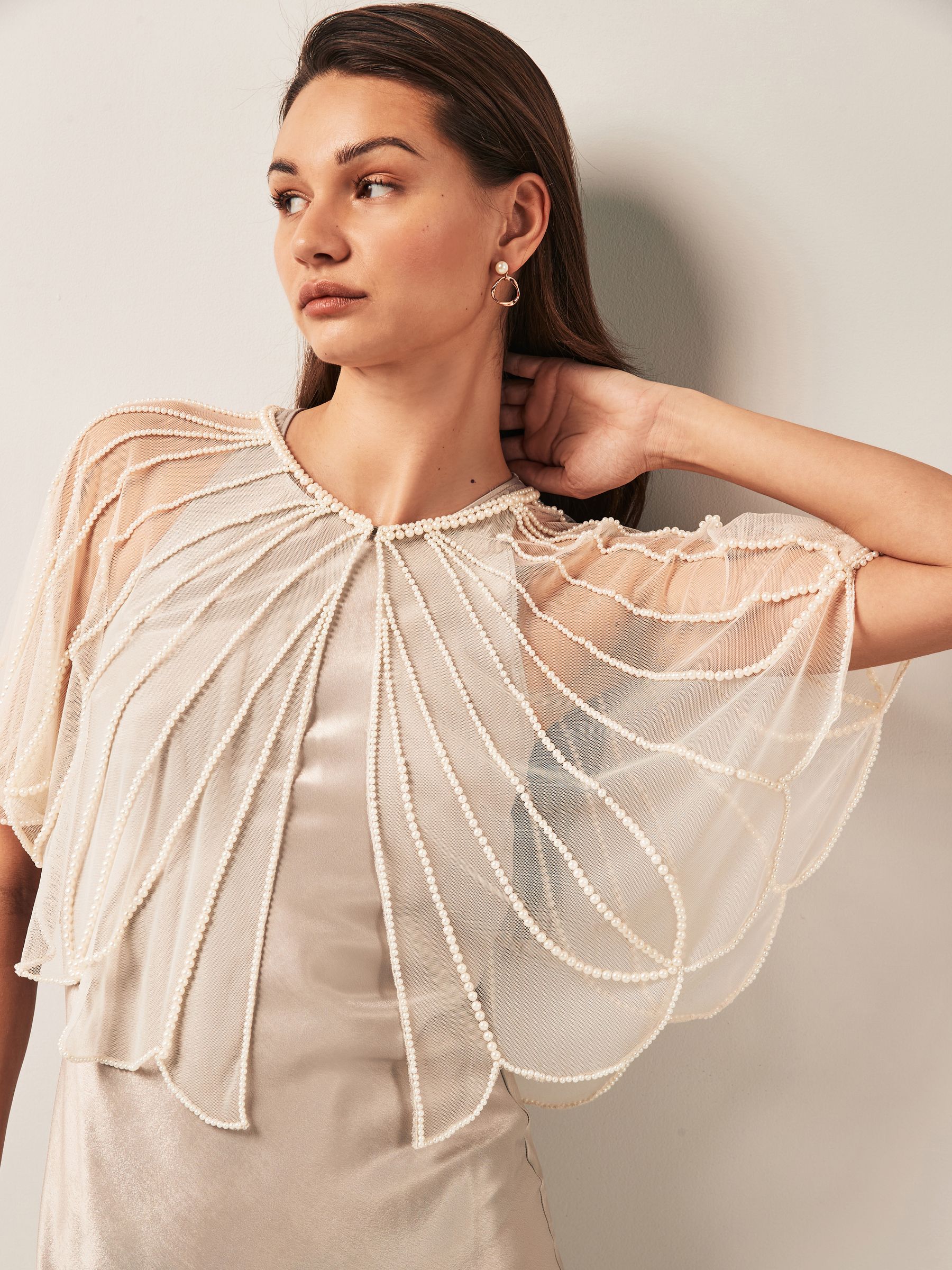 Sheer cape outlet