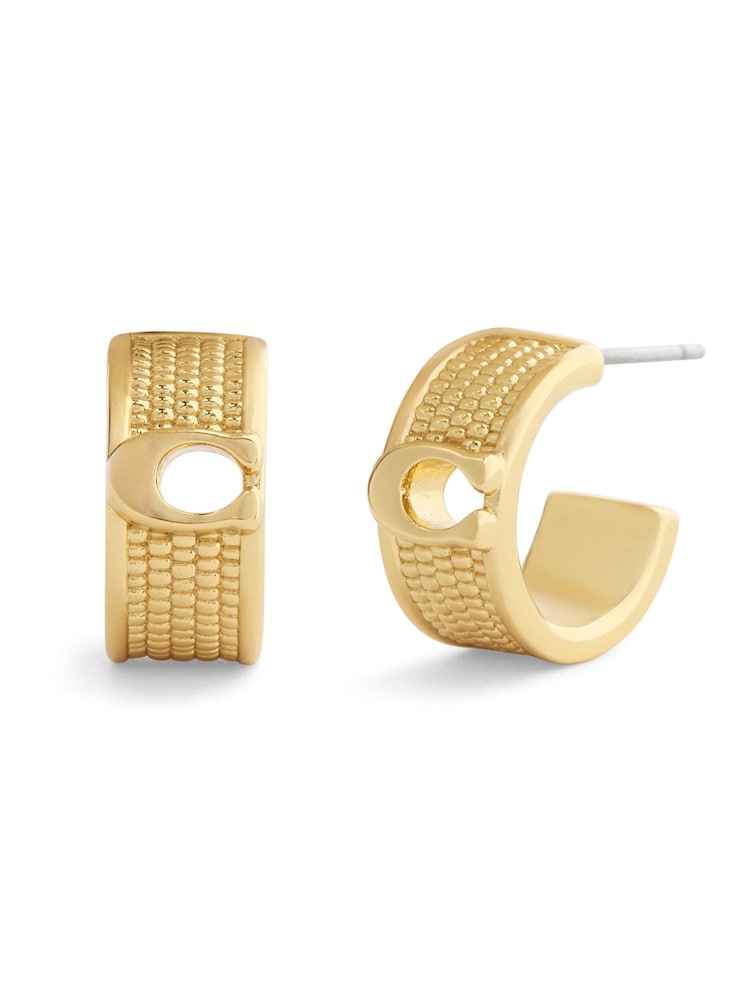 COACH Gold Signature C Textured Huggie Earrings - Image 1 of 3
