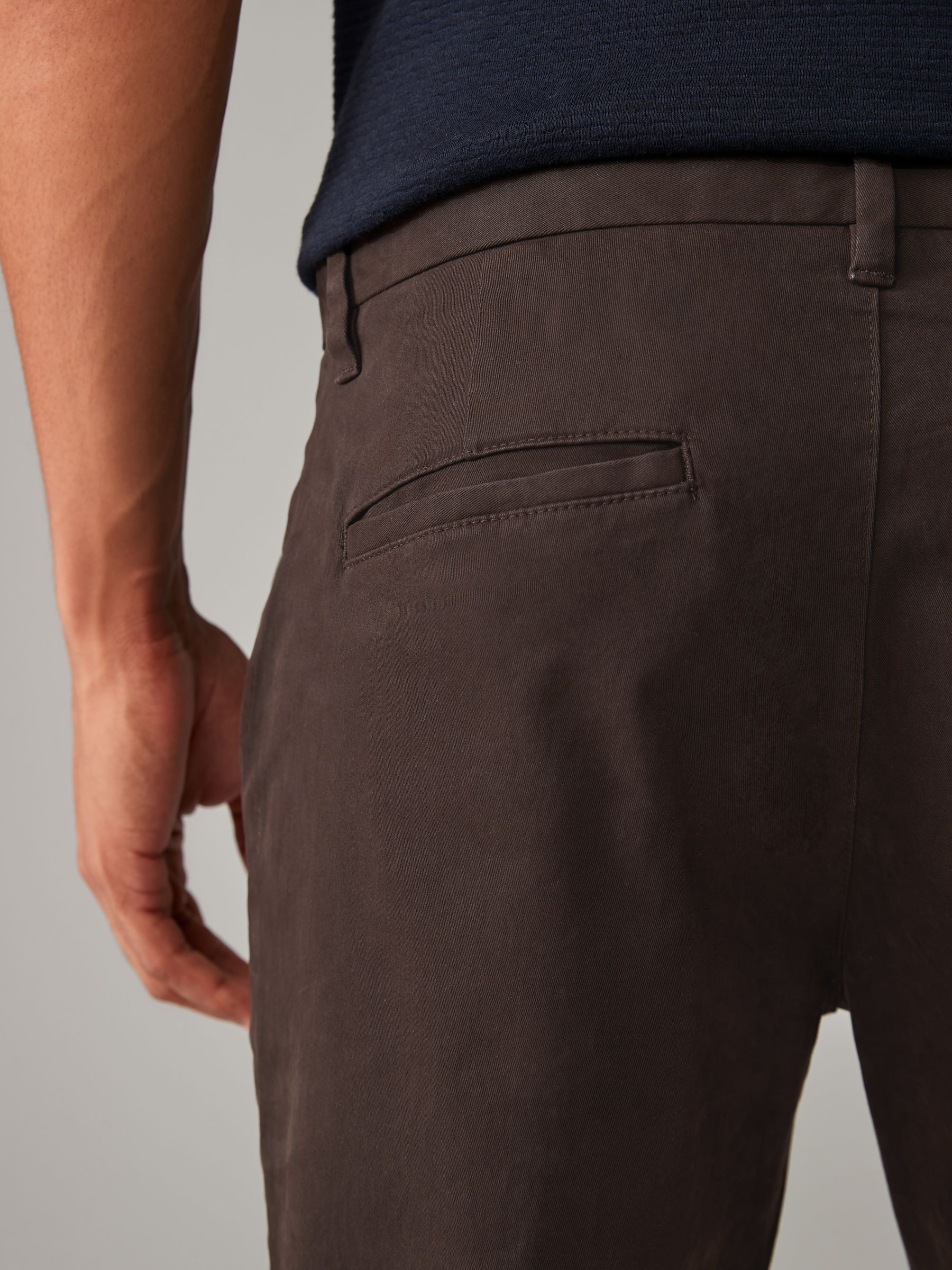 Buy Brown Slim Fit Stretch Chinos Trousers from Next Canada