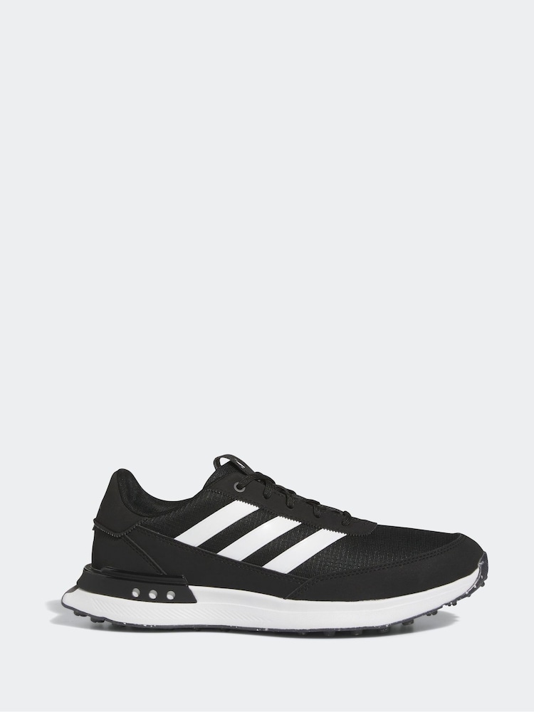 أسود/أبيض - 2 أحذية رياضية بنعل غير مسنن Golf S24G من adidas - صورة 1 من 9