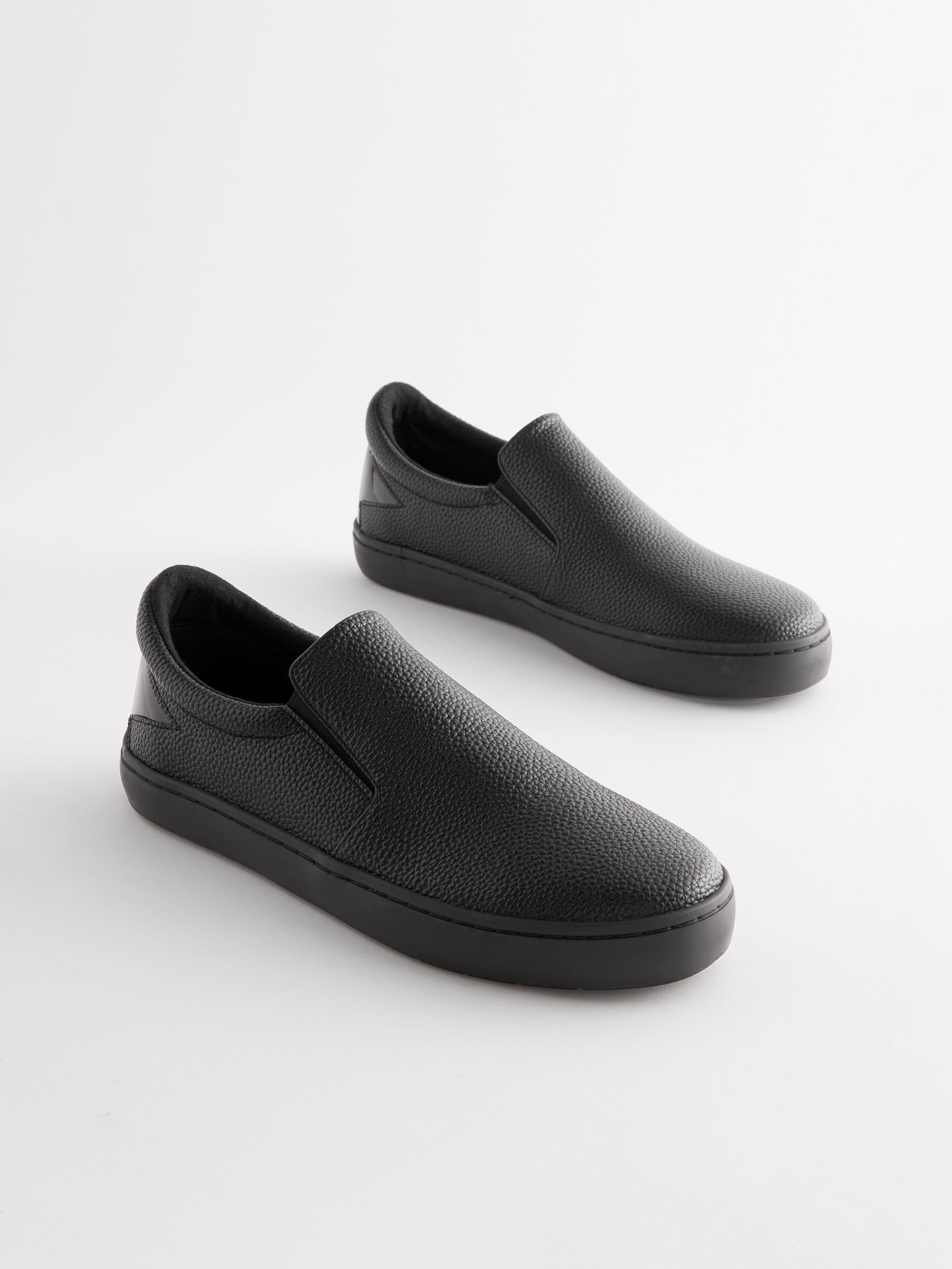 Buy Black Flood Forever Comfort Patent Slip On Trainers from Next Luxembourg