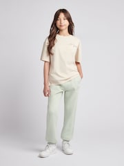 Mátově zelená - New Balance Jogger kalhoty s malým logem vzadu - Obrázek 5 z 8