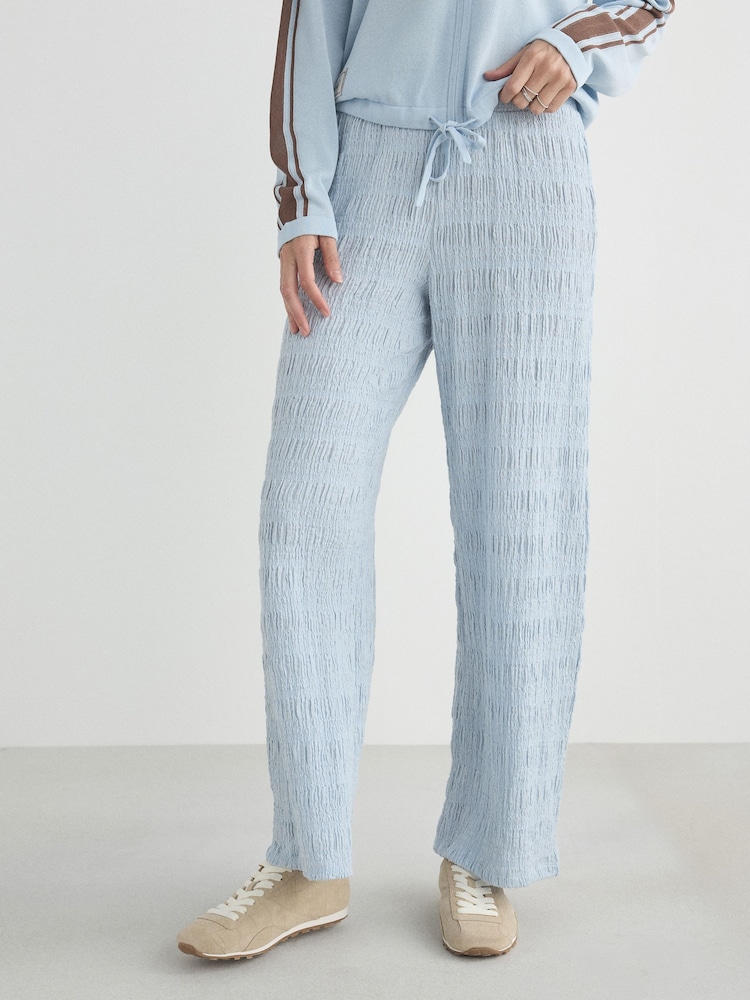 Azul - Pantalones de pernera ancha con diseño texturizado - Imagen 2 de 4 Azul - Pantalones de pernera ancha con diseño texturizado - Imagen 2 de 4