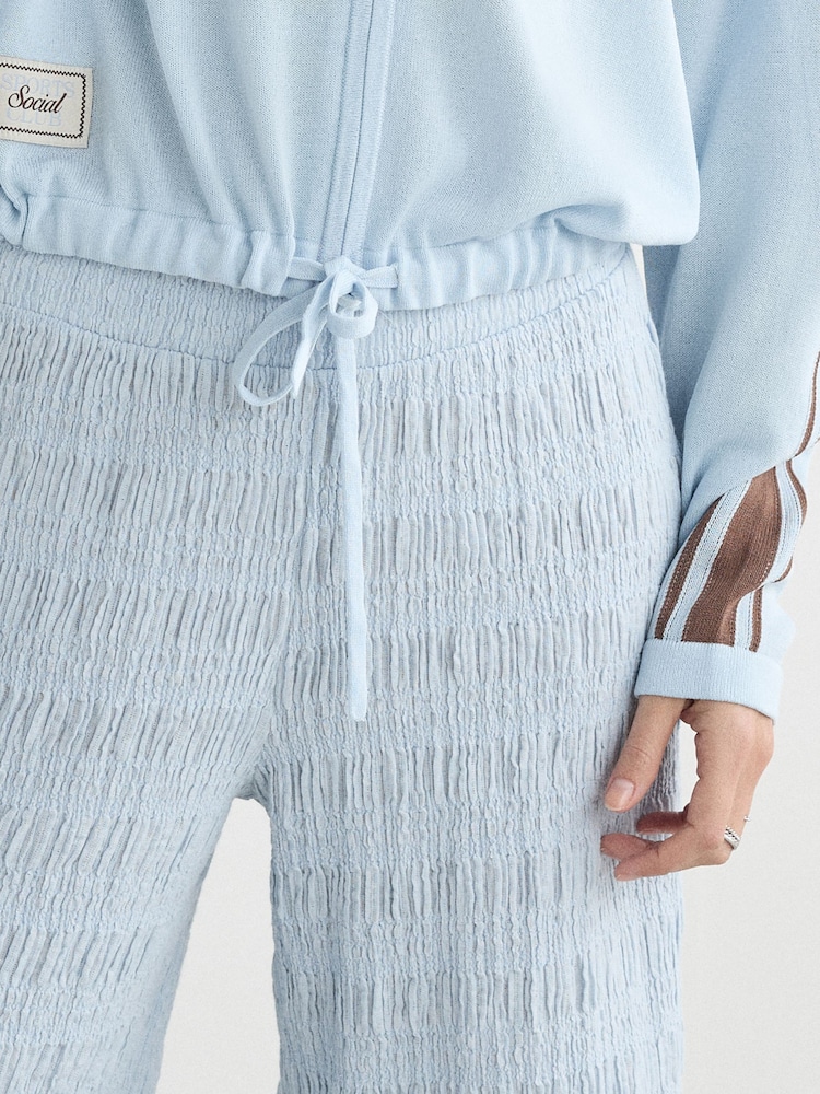 Azul - Pantalones de pernera ancha con diseño texturizado - Imagen 4 de 4 Azul - Pantalones de pernera ancha con diseño texturizado - Imagen 4 de 4