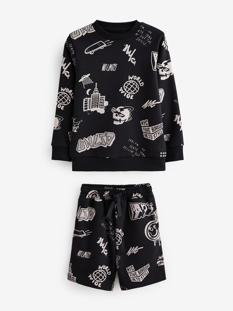 Black All-Over Printed Crew Neck Sweatshirt and Shorts Set (3-16yrs) - Image 1 of 7 Black All-Over Printed Crew Neck Sweatshirt and Shorts Set (3-16yrs) - Image 1 of 7