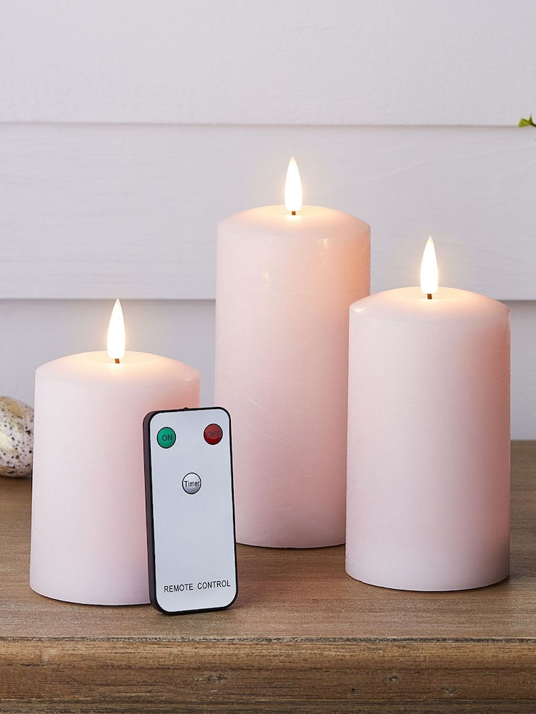 Lights4fun Pastel Pink TruGlow® LED Outdoor Pillar Battery Operated Candle Trio - Image 1 of 2