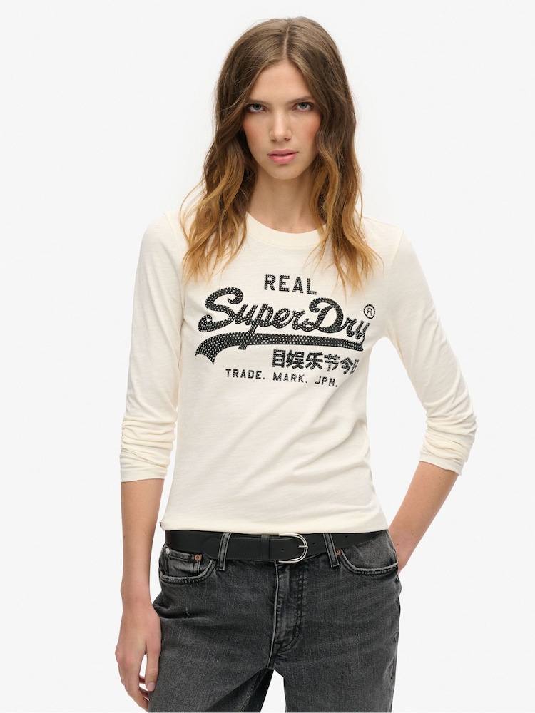 Superdry Cream Slub 100% Cotton Embellished Vl Graphic Long Sleeve Top - Image 1 of 5 Superdry Cream Slub 100% Cotton Embellished Vl Graphic Long Sleeve Top - Image 1 of 5