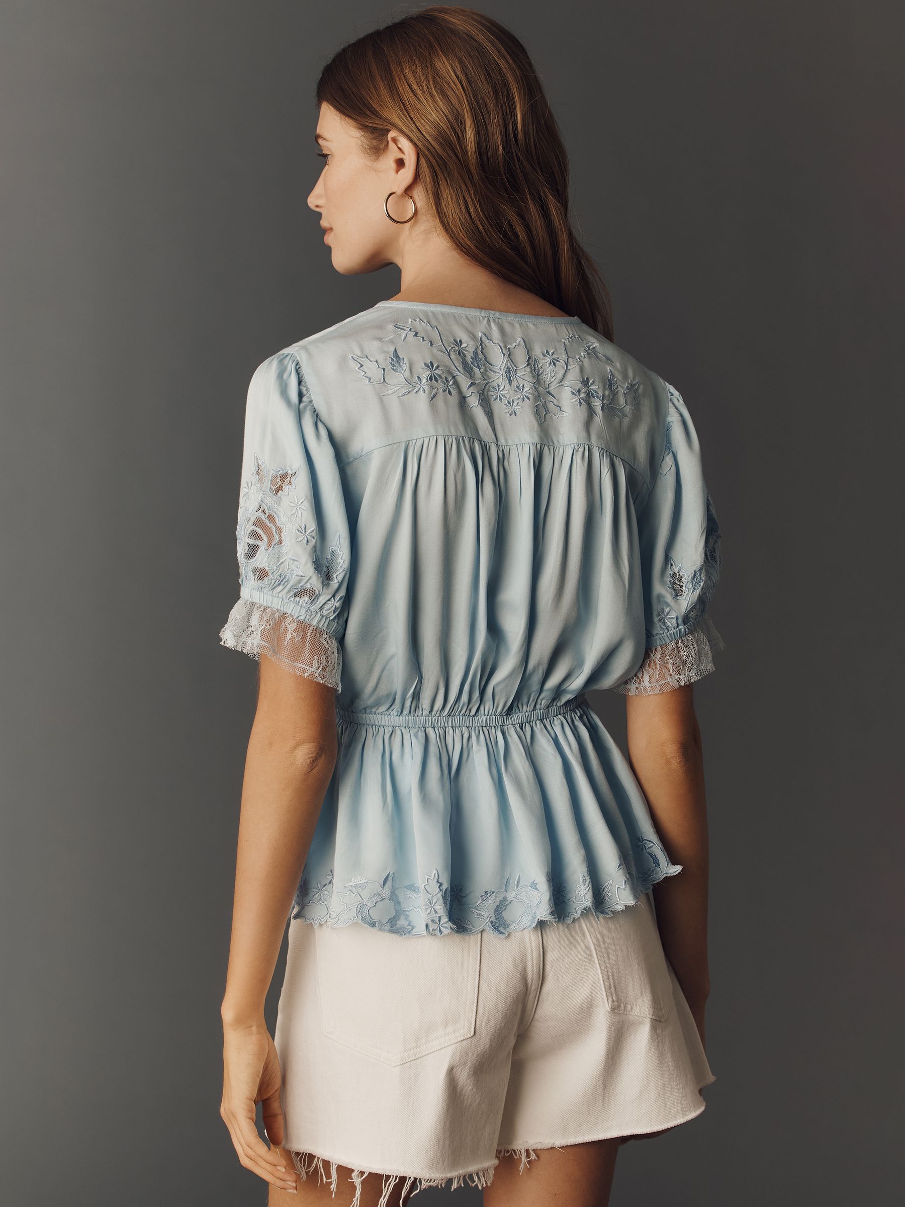 Buy Anthropologie Blue Embroidered V-Neck Peplum Blouse from Next USA