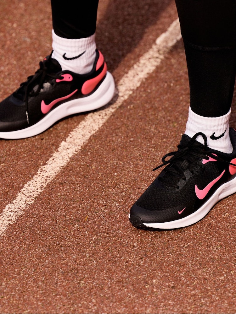Buy Nike Black/Pink Youth Revolution Trainers from the Next UK