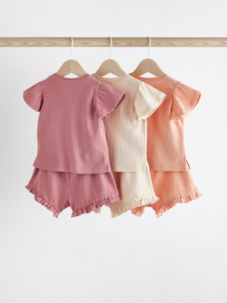 Pink mit Pointelle-Muster - 3er-Pack für Babys bestehend aus T-Shirt und Shorts aus 100 % Baumwolle - Bild 2 von 15 Pink mit Pointelle-Muster - 3er-Pack für Babys bestehend aus T-Shirt und Shorts aus 100 % Baumwolle - Bild 2 von 15