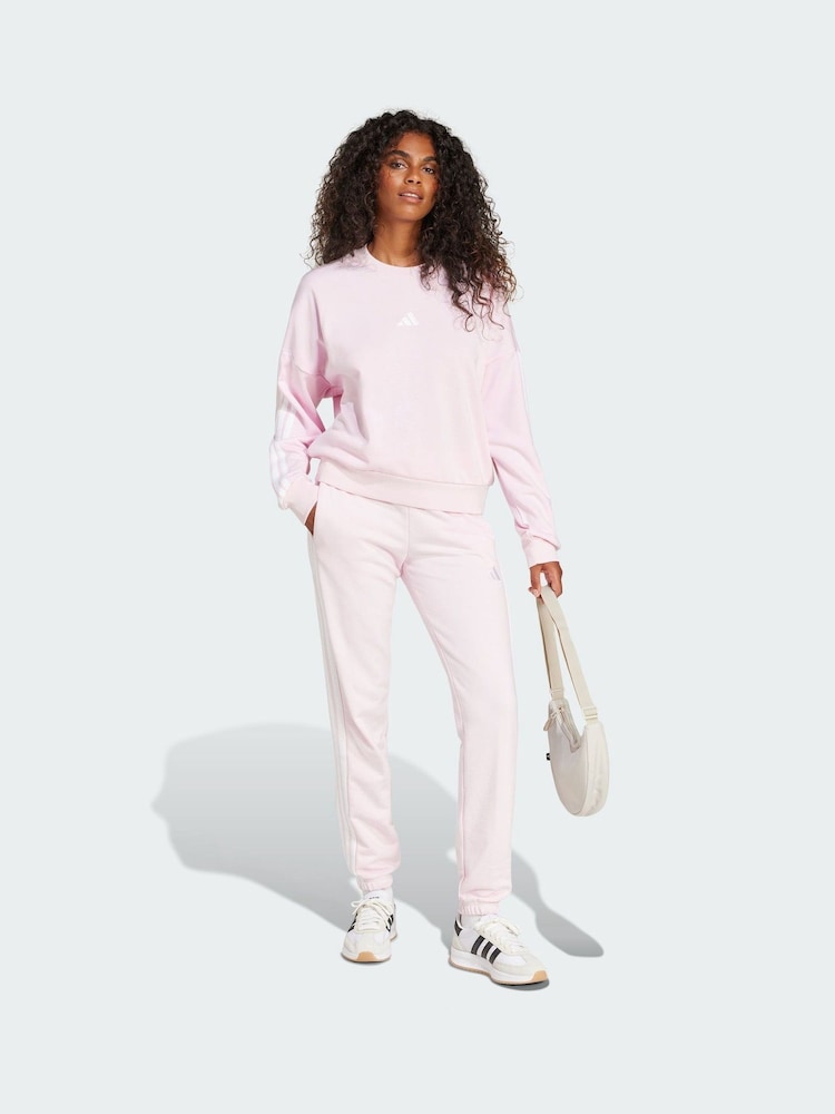 adidas Pink Essentials 3-Stripes French Terry Cuffed Joggers - Image 1 of 5 adidas Pink Essentials 3-Stripes French Terry Cuffed Joggers - Image 1 of 5