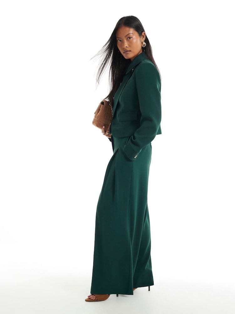 River Island Petite Crepe-bukser med vide bukseben - Bilde 1 av 4