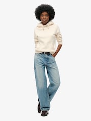 كريمي شوفاني بخيوط شاحبة - سترة هودي بشعار معدني Luxe من Superdry - صورة 1 من 4