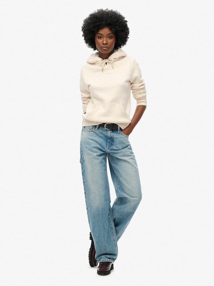 كريمي شوفاني بخيوط شاحبة - سترة هودي بشعار معدني Luxe من Superdry - صورة 1 من 4