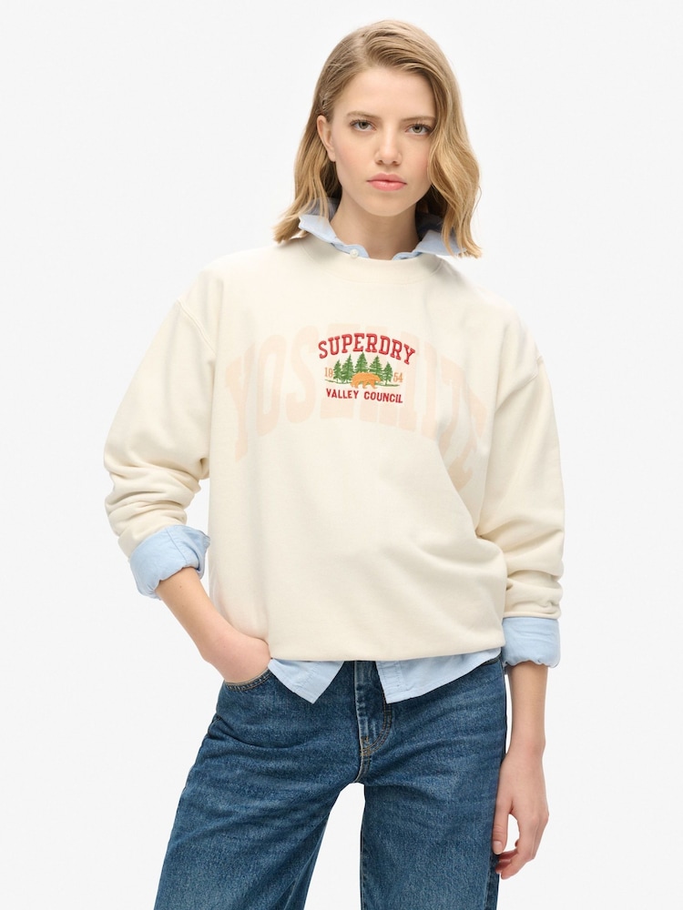 Superdry Cream Eclipse Navy Travel Souvenir Loose Crew Sweatshirt - Image 1 of 1