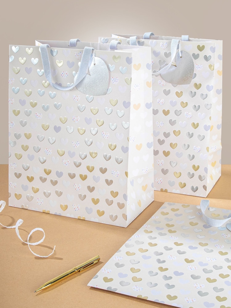 Hallmark White 3 Large Wendy Jones-Blackett Foil Heart Gift Bags - Image 1 of 6 Hallmark White 3 Large Wendy Jones-Blackett Foil Heart Gift Bags - Image 1 of 6