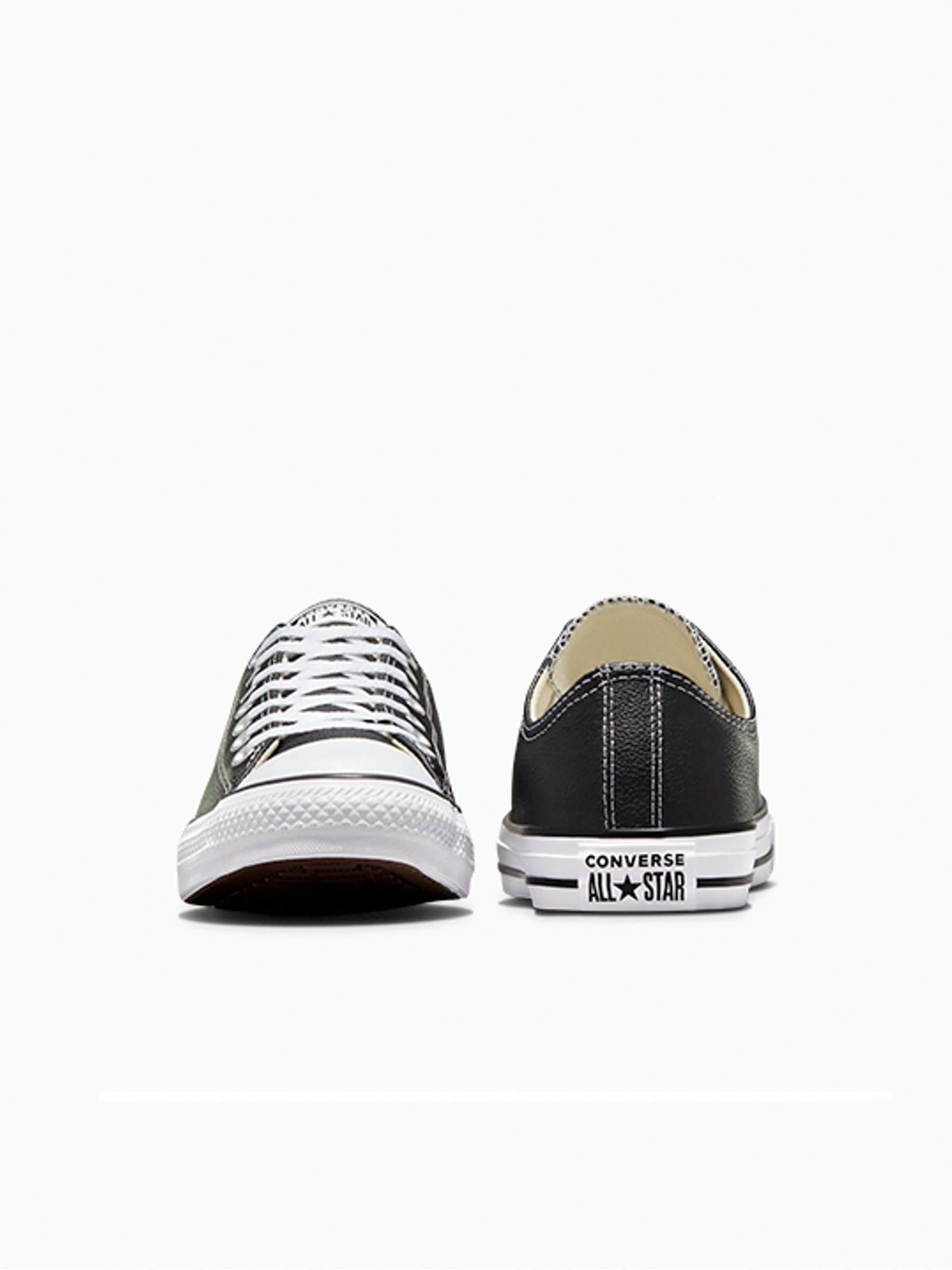 Buy Converse Black Leather Chuck Ox Trainers from Next USA