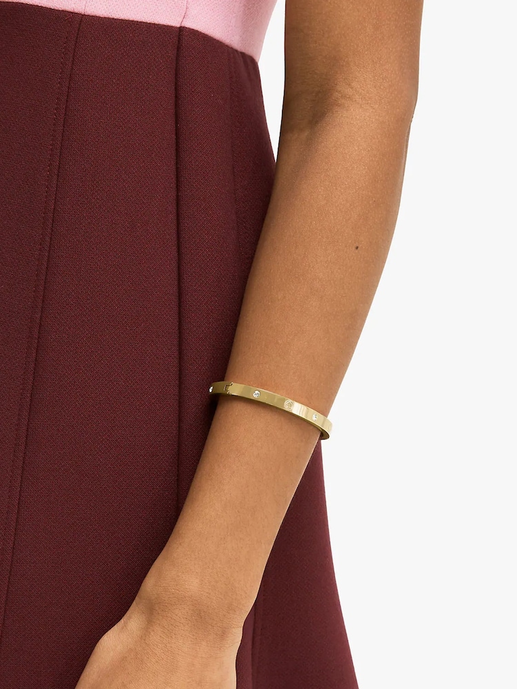 Kate Spade New York Infinite Spade Crystal Engraved Bangle - Image 1 of 3