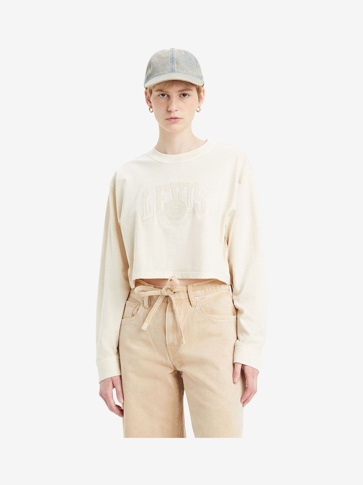 Levi's® White Swan Cropped Long-Sleeve Football 100% Cotton T-Shirt - Image 1 of 6 Levi's® White Swan Cropped Long-Sleeve Football 100% Cotton T-Shirt - Image 1 of 6