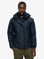 צבע נייבי-שחור/נייבי - Superdry ז'קט רוח עם קפוצ'ון, דגם Mountain - תמונה 1 מתוך 6