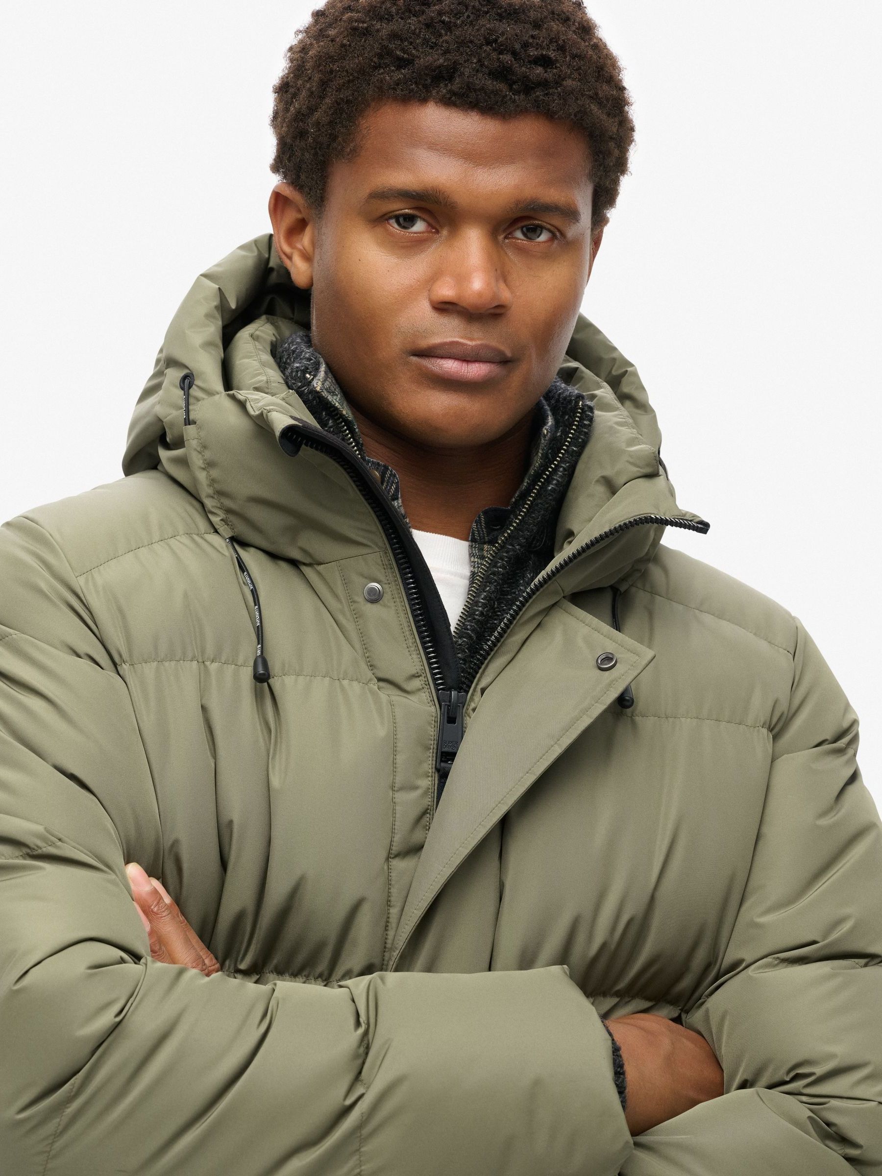 Buy Superdry Dusty Olive Green Hooded Sports Puffer Mid Coat Jacket from Next Canada