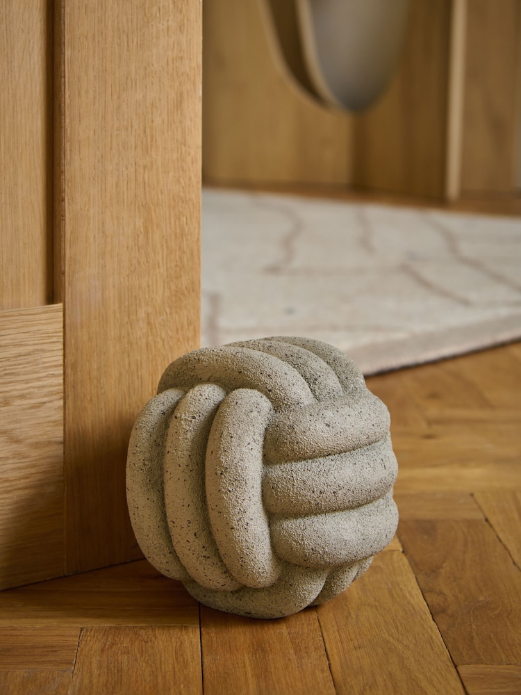 Natural Textured Knotted Ceramic Doorstop - Image 1 of 4 Natural Textured Knotted Ceramic Doorstop - Image 1 of 4