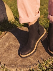 TOMS Dakota Water Resistant Leather with Faux Fur Boots - Image 1 of 7