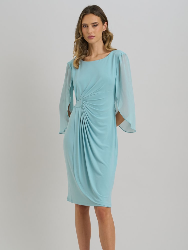 Gina Bacconi Blue Ryder Faux Wrap Dress With Tulip Sleeve - Image 1 of 7 Gina Bacconi Blue Ryder Faux Wrap Dress With Tulip Sleeve - Image 1 of 7