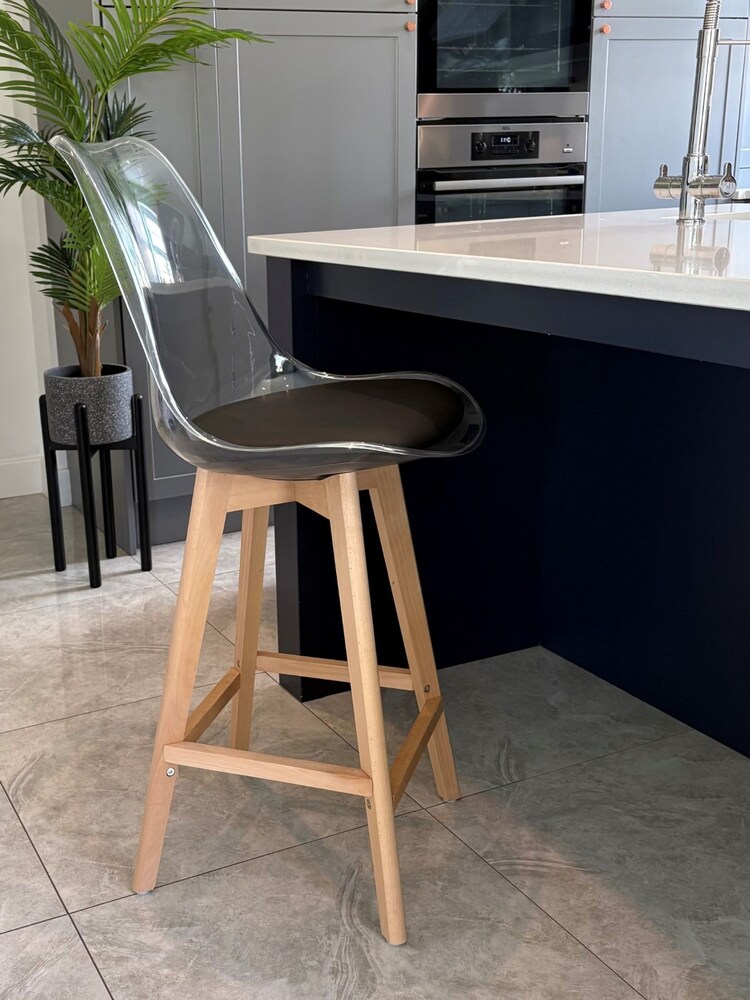 Fusion Living Black Soho Clear Plastic Bar Stool with Light Wood Legs - Image 1 of 5 Fusion Living Black Soho Clear Plastic Bar Stool with Light Wood Legs - Image 1 of 5