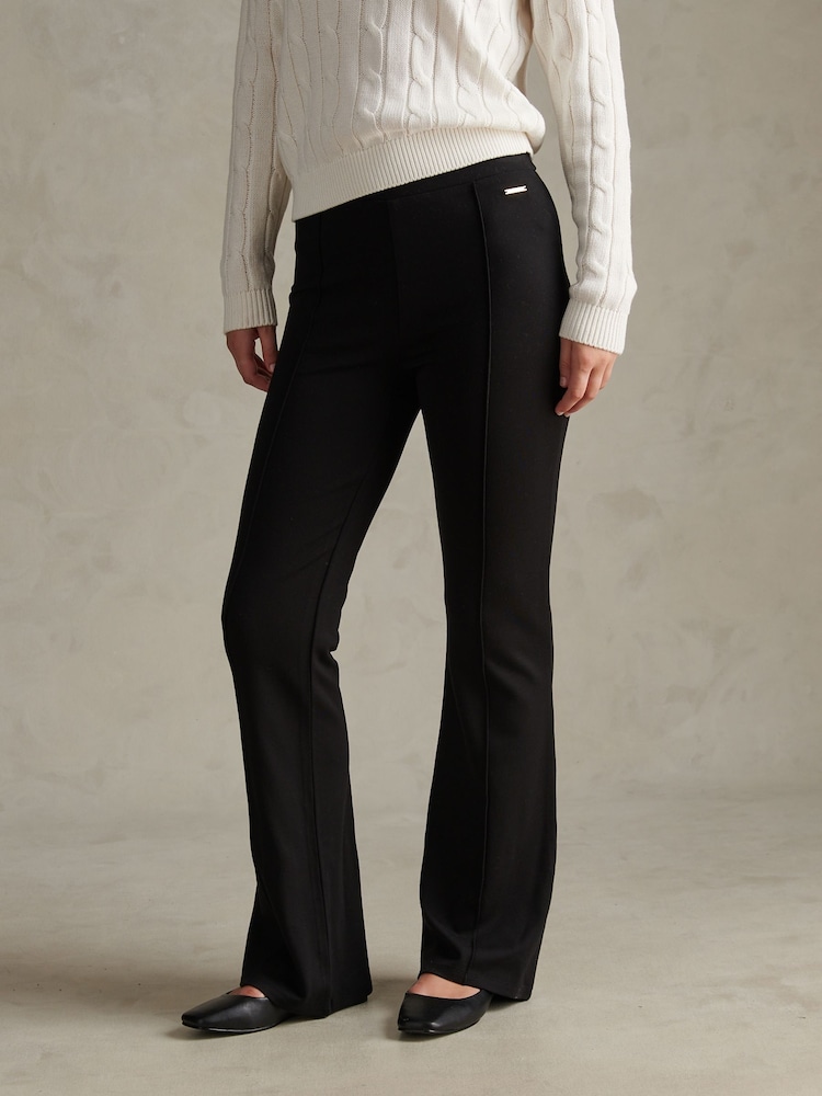 U.S. Polo Assn Black Pintuck Ponte Flare Leggings - Image 1 of 7 U.S. Polo Assn Black Pintuck Ponte Flare Leggings - Image 1 of 7
