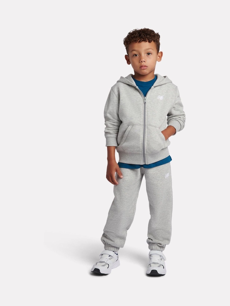 Gris - Conjunto de pantalón deportivo y pantalones de chándal con cremallera y logo pequeño de New Balance. - Imagen 1 de 10 Gris - Conjunto de pantalón deportivo y pantalones de chándal con cremallera y logo pequeño de New Balance. - Imagen 1 de 10