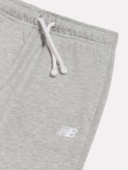 Gris - Conjunto de pantalón deportivo y pantalones de chándal con cremallera y logo pequeño de New Balance. - Imagen 10 de 10