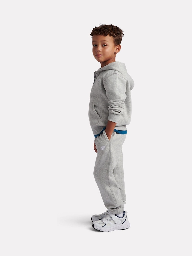 Gris - Conjunto de pantalón deportivo y pantalones de chándal con cremallera y logo pequeño de New Balance. - Imagen 2 de 10 Gris - Conjunto de pantalón deportivo y pantalones de chándal con cremallera y logo pequeño de New Balance. - Imagen 2 de 10