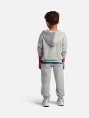 Gris - Conjunto de pantalón deportivo y pantalones de chándal con cremallera y logo pequeño de New Balance. - Imagen 3 de 10