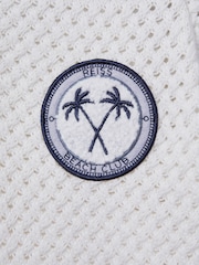 Reiss Optic White Stark 3-9 yrs Textured Cotton Half-Zip Polo Shirt - Image 4 of 4