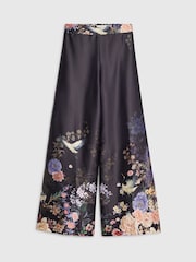 River Island Black Petite Border Print Wide Leg Trousers - Image 1 of 1