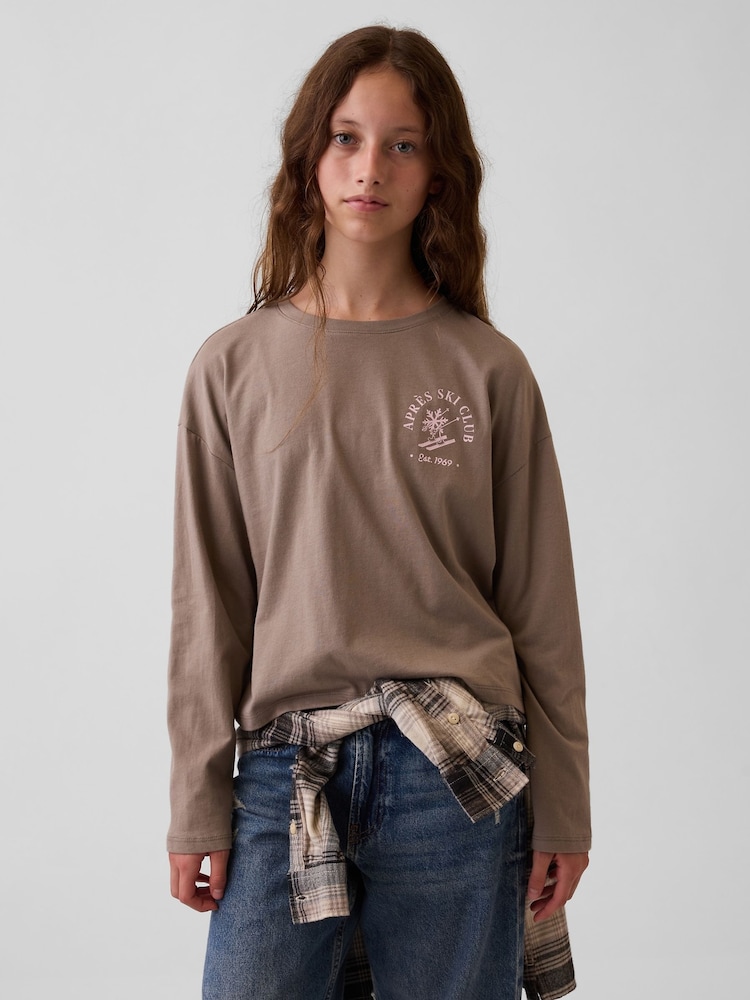 Gap Brown Apres SKi Oversized Graphic Long Sleeve T-Shirt (4-13yrs) - Image 1 of 5 Gap Brown Apres SKi Oversized Graphic Long Sleeve T-Shirt (4-13yrs) - Image 1 of 5