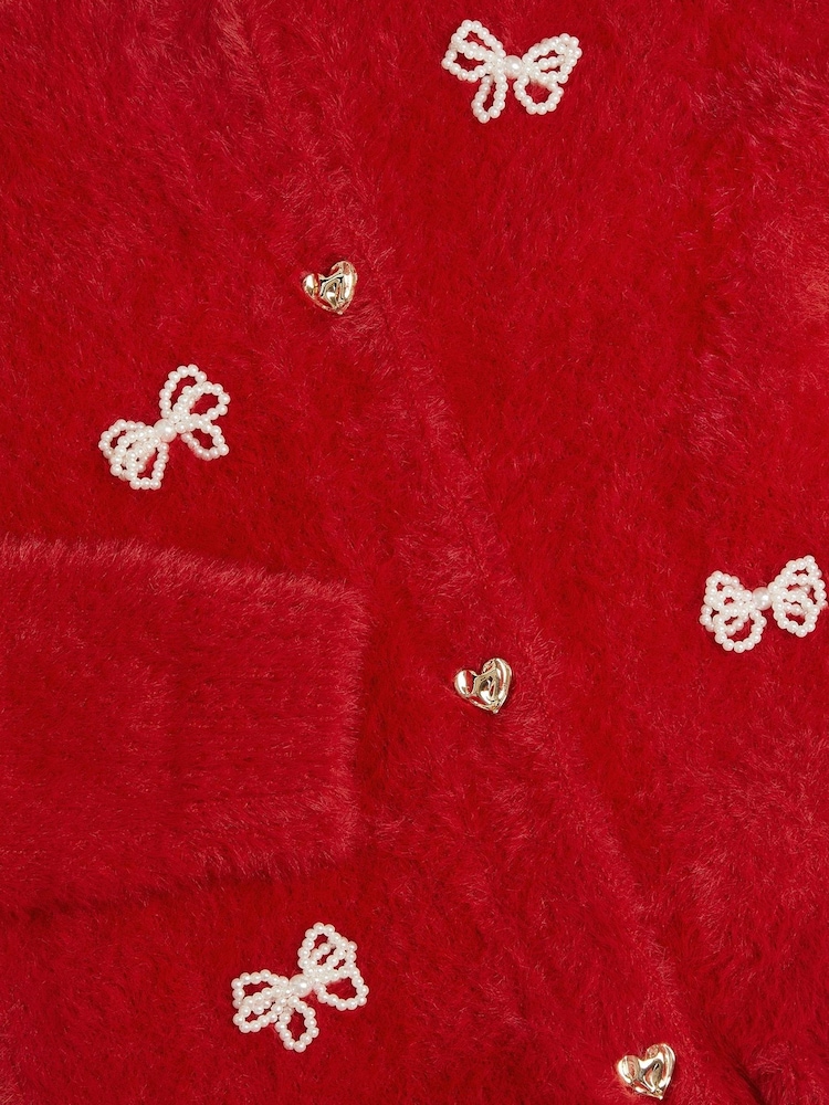 Monsoon Pearl Bow Fluffy Cardigan - Obraz 2 z 2 Monsoon Pearl Bow Fluffy Cardigan - Obraz 2 z 2