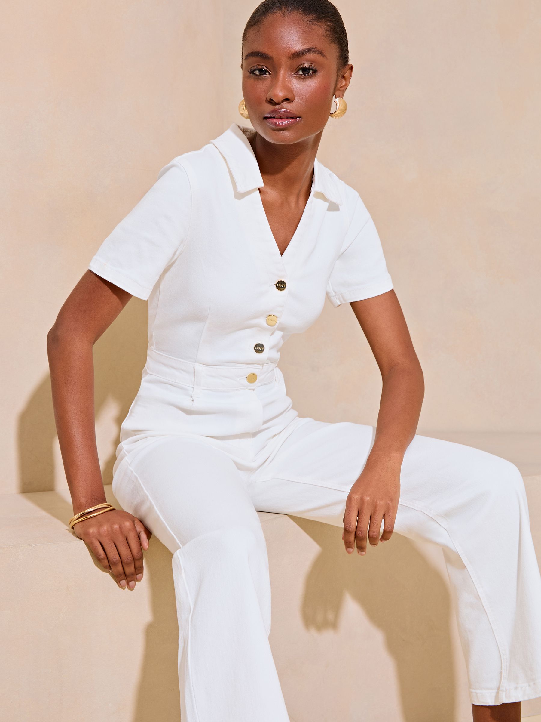 Buy Lipsy Ivory White Denim Short Sleeve Button Through Jumpsuit from Next France