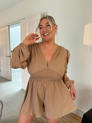 In The Style Beige Carys Whittaker Shirred Waist Button Detail Plunge Long Sleeve Playsuit - Image 1 of 5