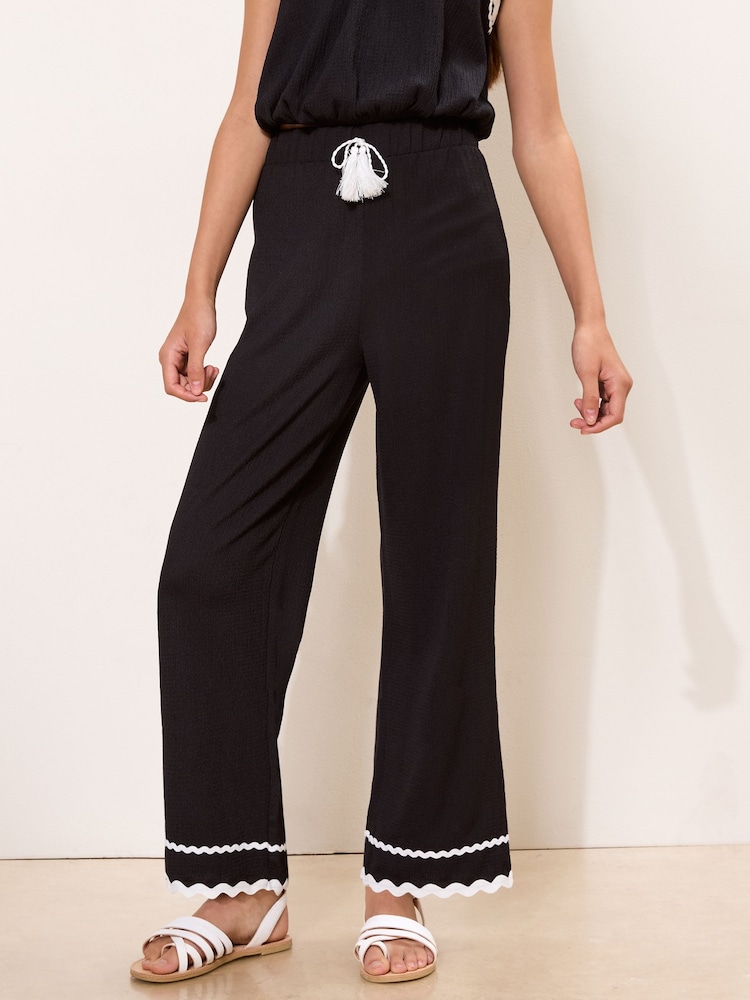 Lipsy Black Contrast Trim Jersey Holiday Trousers (5-14yrs) - Image 2 of 5 Lipsy Black Contrast Trim Jersey Holiday Trousers (5-14yrs) - Image 2 of 5