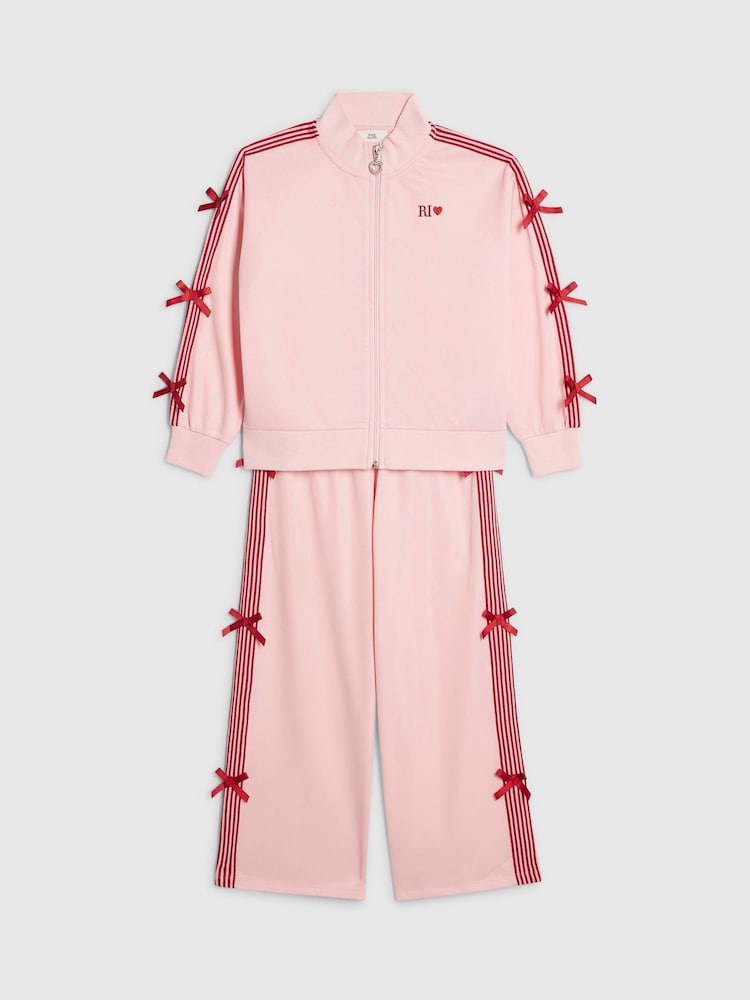 River Island Pink Bow Tricot Zip Thru Jacket & Joggers Set - Image 1 of 5 River Island Pink Bow Tricot Zip Thru Jacket & Joggers Set - Image 1 of 5