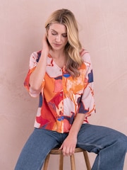 Celtic & Co. orangefarbene, drapierte Bluse mit V-Ausschnitt und Knopfleiste - Bild 2 von 5