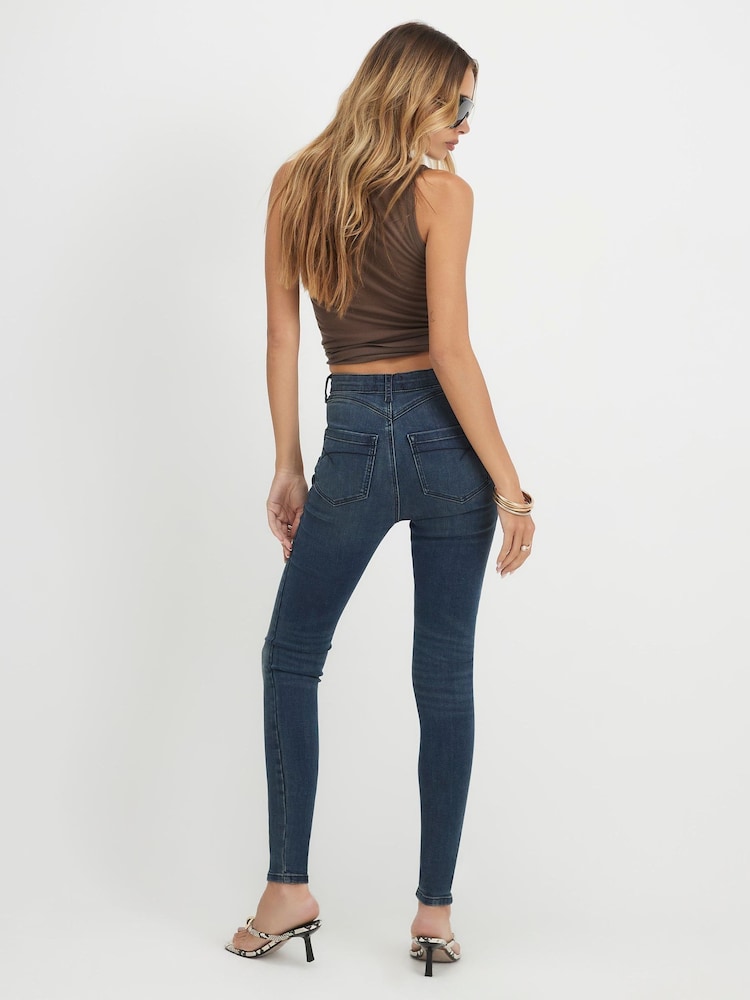 أزرق شاحب - بنطلون جينز ضيق ناحت للقوام بخصر متوسط الارتفاع من River Island - صورة 2 من 4 أزرق شاحب - بنطلون جينز ضيق ناحت للقوام بخصر متوسط الارتفاع من River Island - صورة 2 من 4