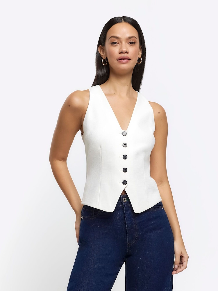 River Island Figurbetonte Weste mit Knopfleiste - Bild 1 von 7 River Island Figurbetonte Weste mit Knopfleiste - Bild 1 von 7