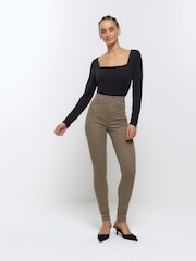 River Island Green High Rise Skinny carpenter Jeans - Image 1 of 7