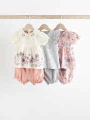 Pink/Weiß mit Blumenmuster - 3er-Pack für Babys bestehend aus T-Shirt und Shorts aus 100 % Baumwolle - Bild 1 von 8