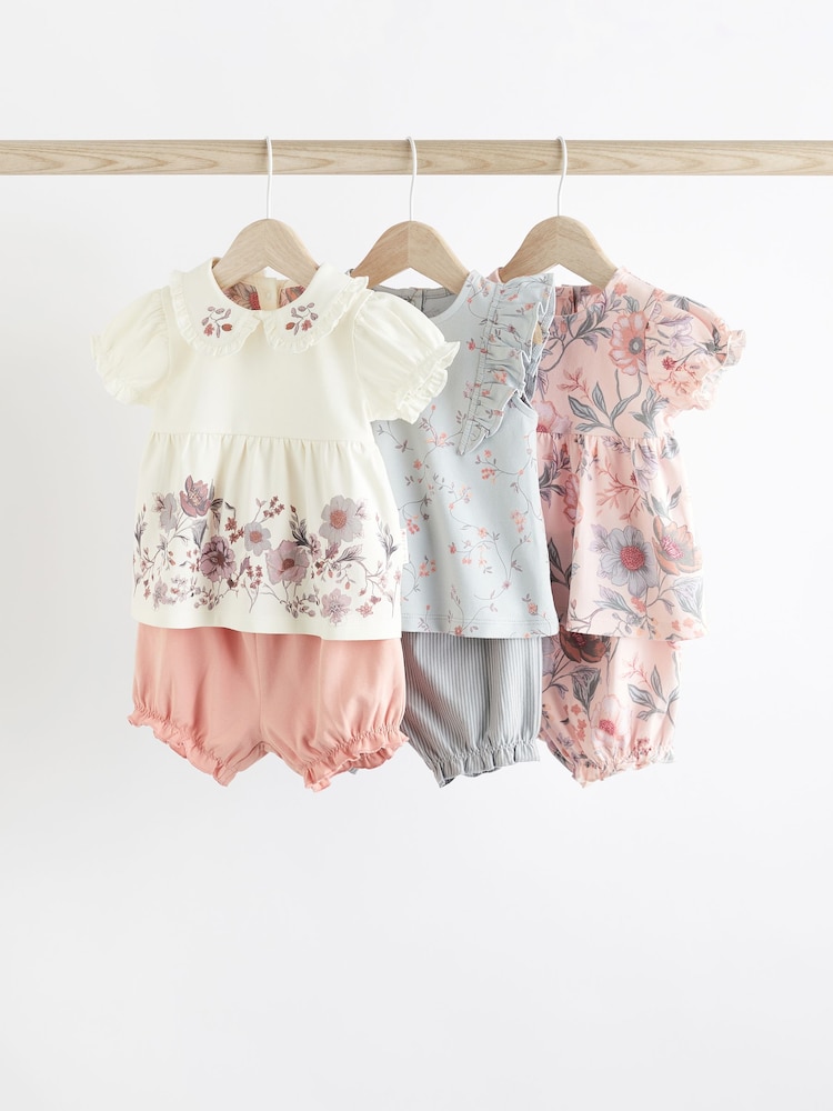 Pink/Weiß mit Blumenmuster - 3er-Pack für Babys bestehend aus T-Shirt und Shorts aus 100 % Baumwolle - Bild 1 von 8